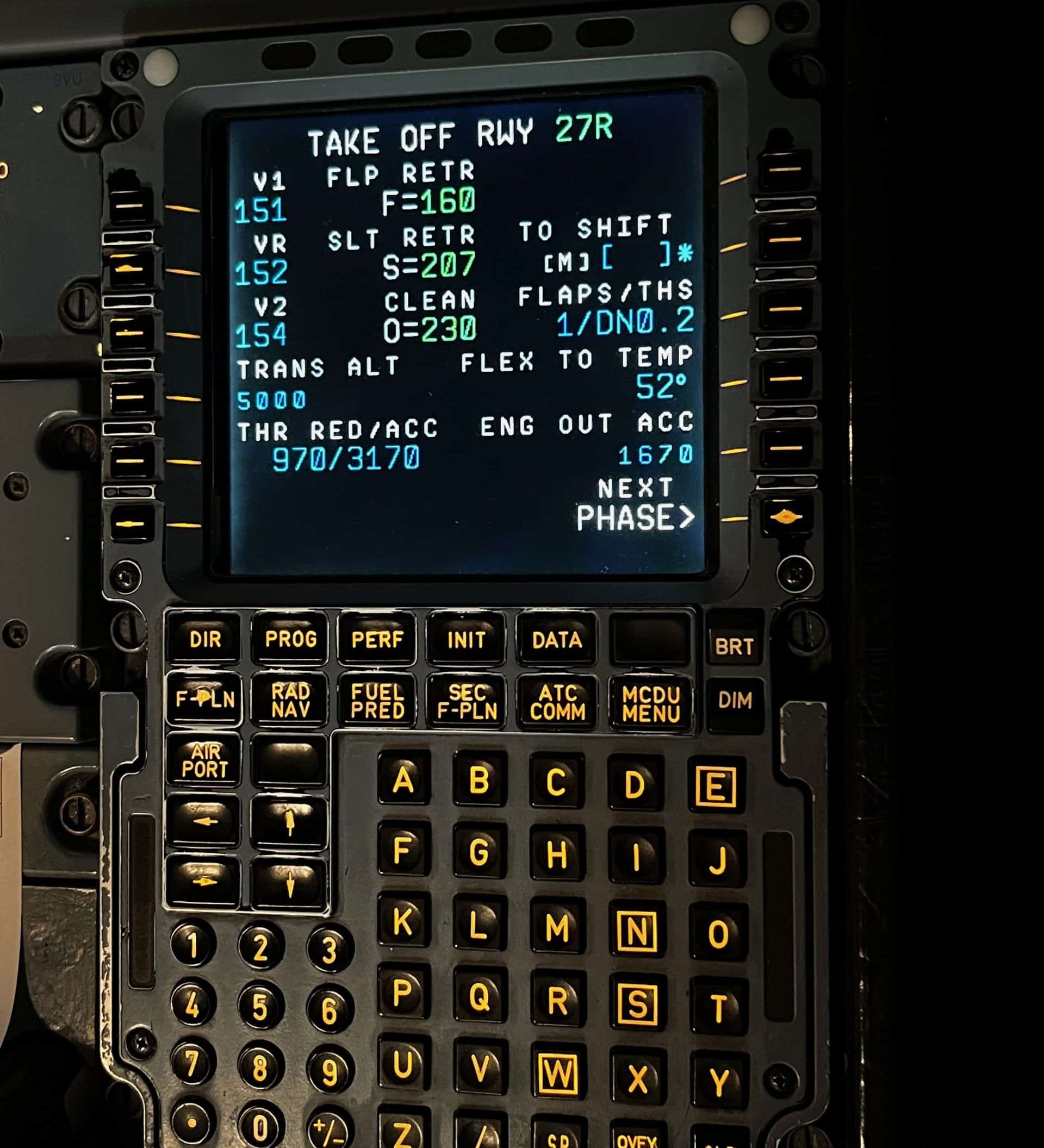 Pilot configuring Airbus A320 MCDU during preflight setup