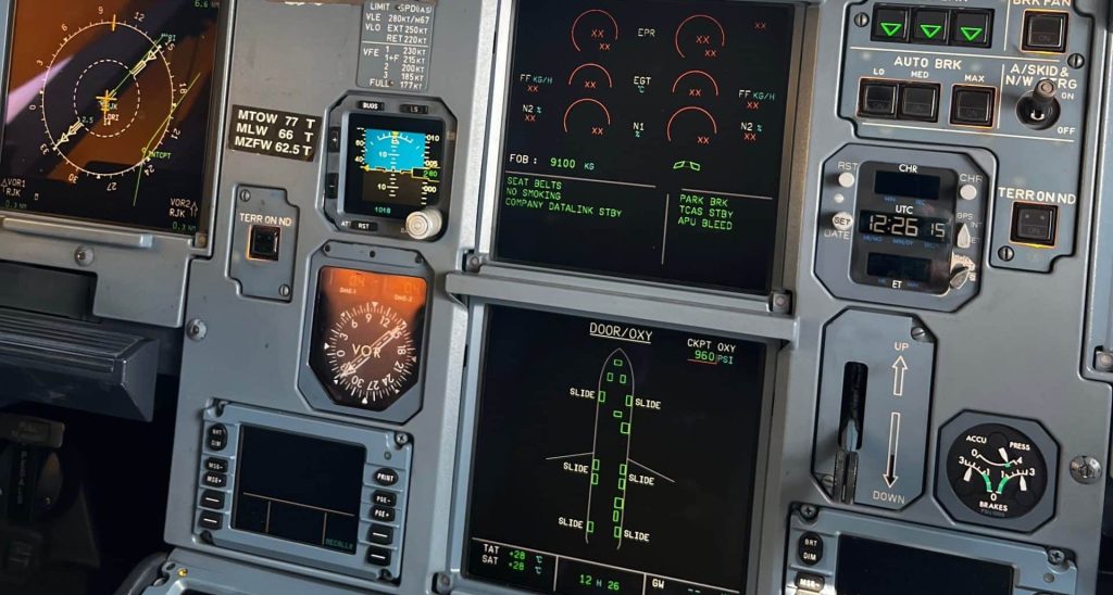 Labeled graphic of Airbus A320 cockpit systems from center pedestal