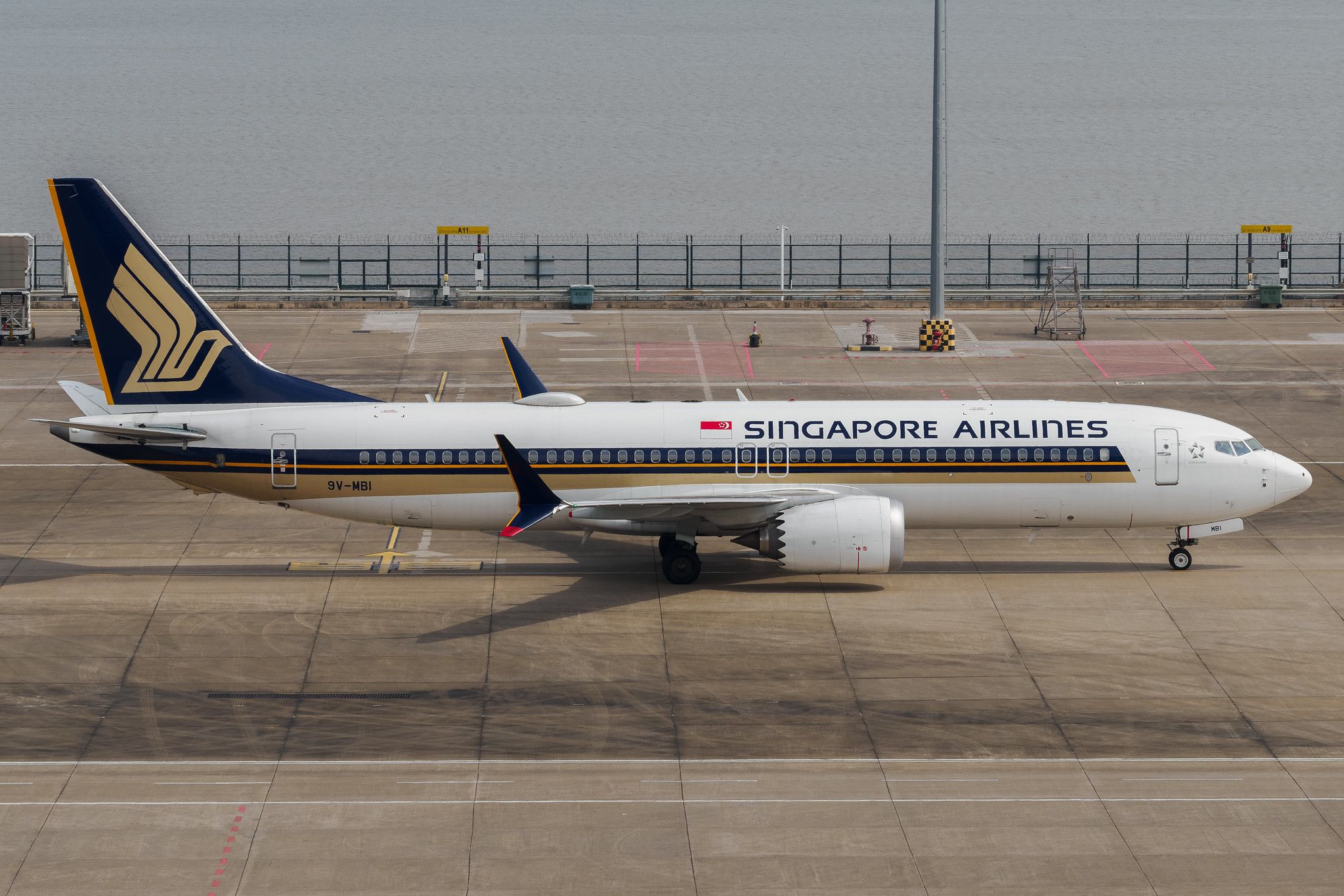 Singapore Airlines Boeing 737-800 parked at Singapore Changi Airport ahead of its final flight